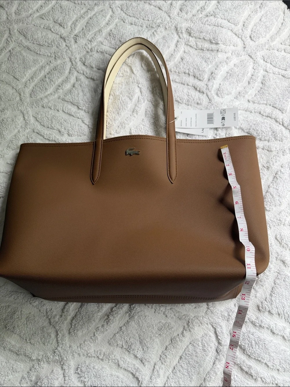 Brand new Lacoste Dark Brown Reversible Leather Tote with Croc Logo
